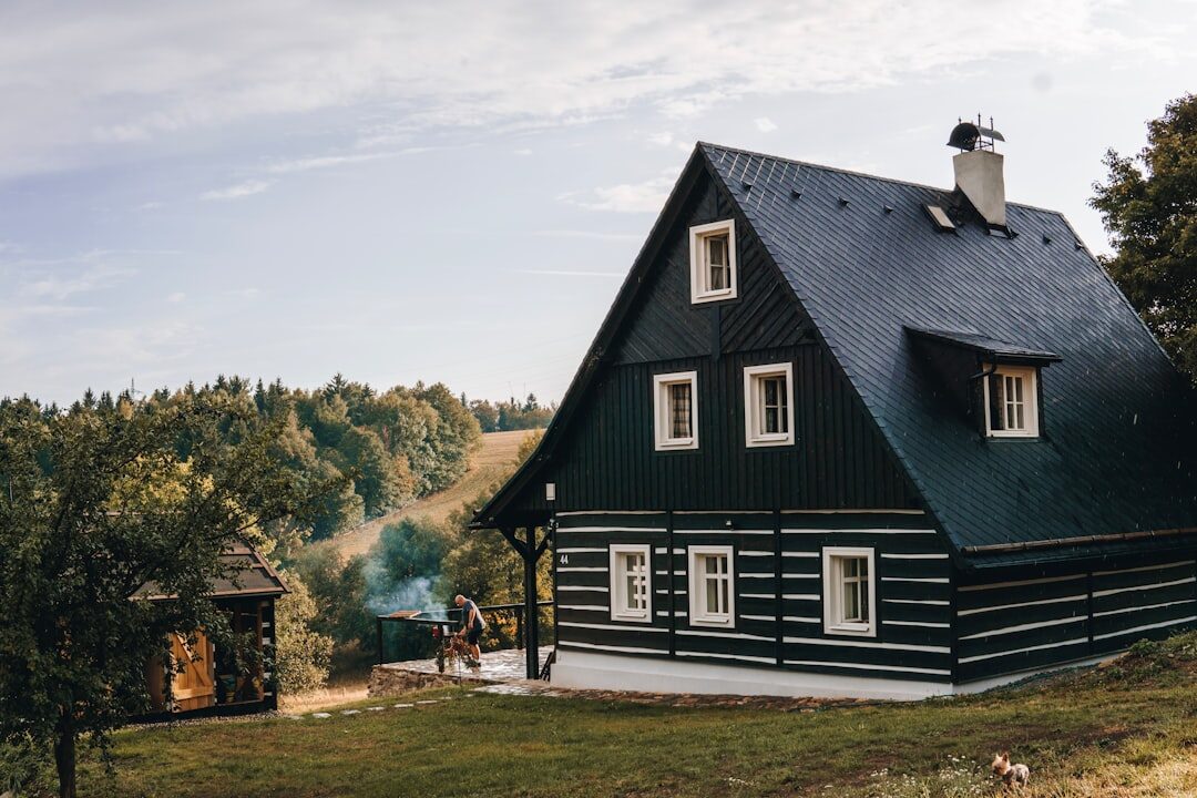 Traditional Czech countryside cottage chalupa surrounded by a garden